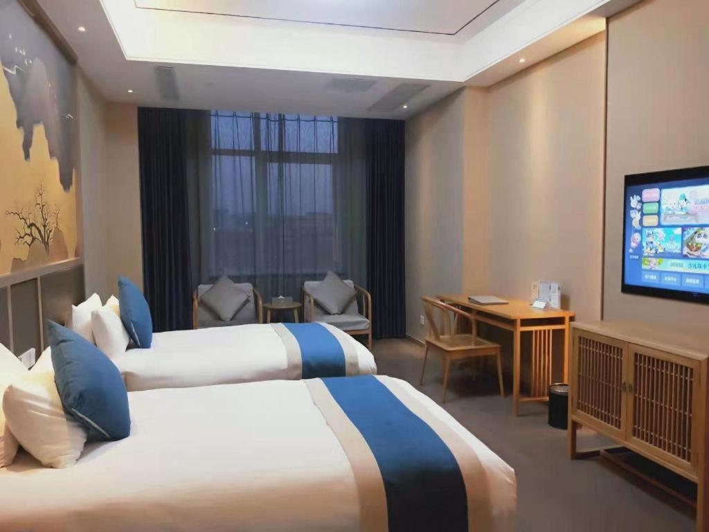 Feicheng Blossom Hotel Exterior photo