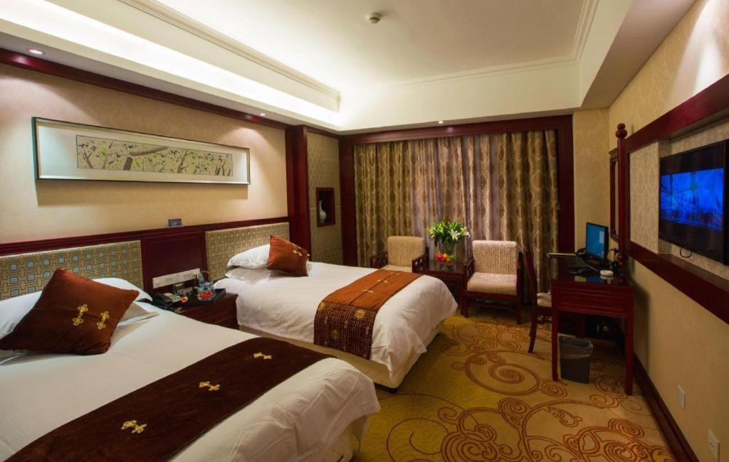 Feicheng Blossom Hotel Exterior photo
