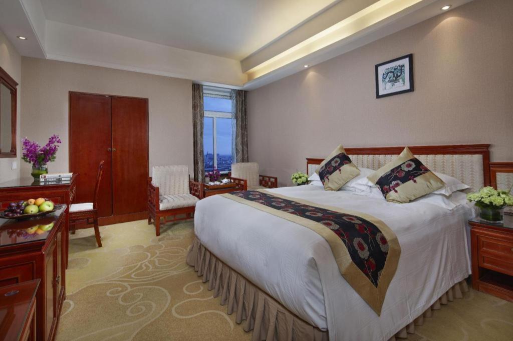 Feicheng Blossom Hotel Exterior photo